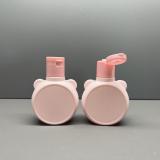 Plastic bottle with flip cap