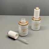 Pearl white glass push dropper bottle with golden shoulder 30ml